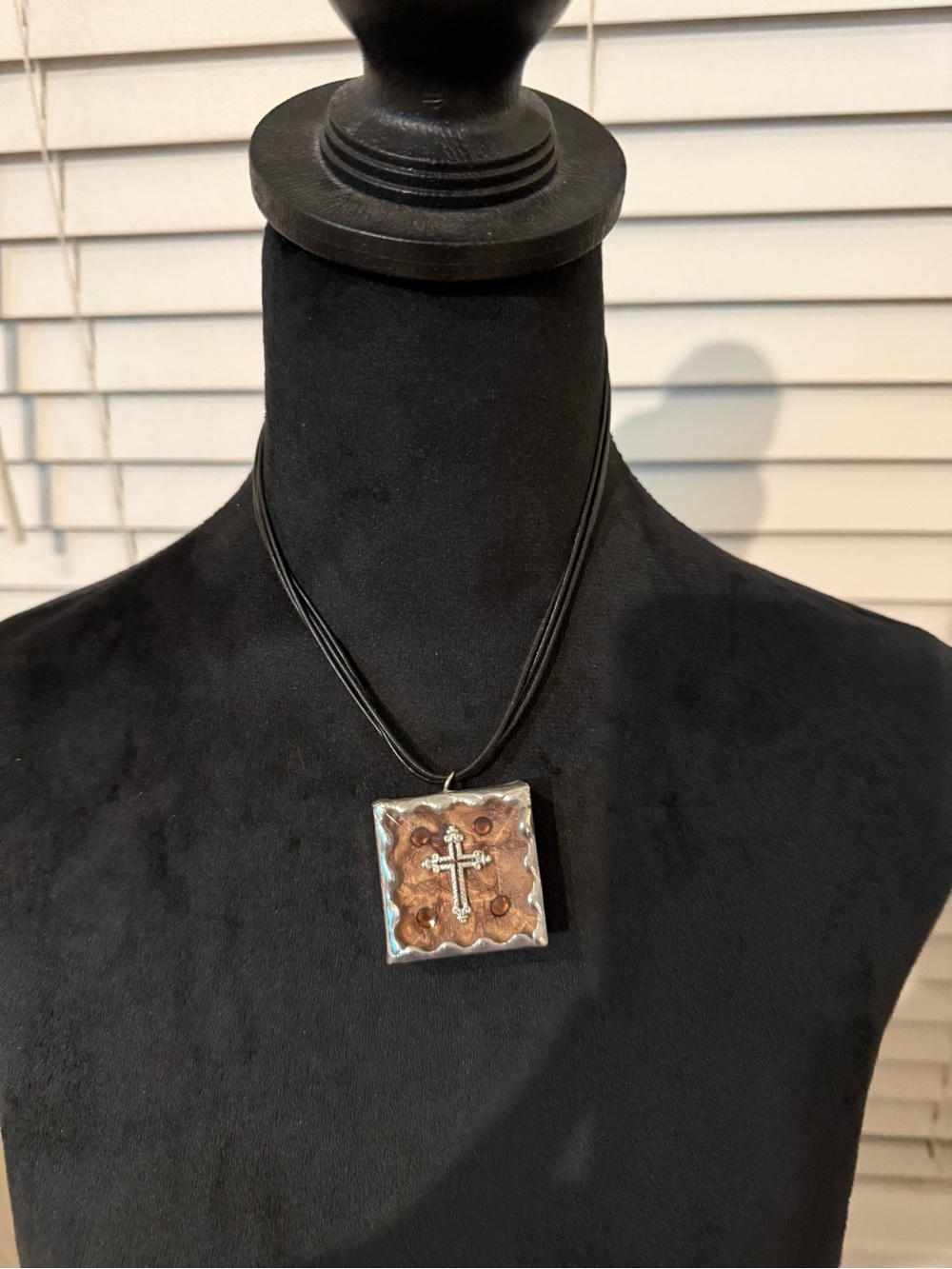 Women's fashion necklace that is reversible. Cross and rhinestone heart.